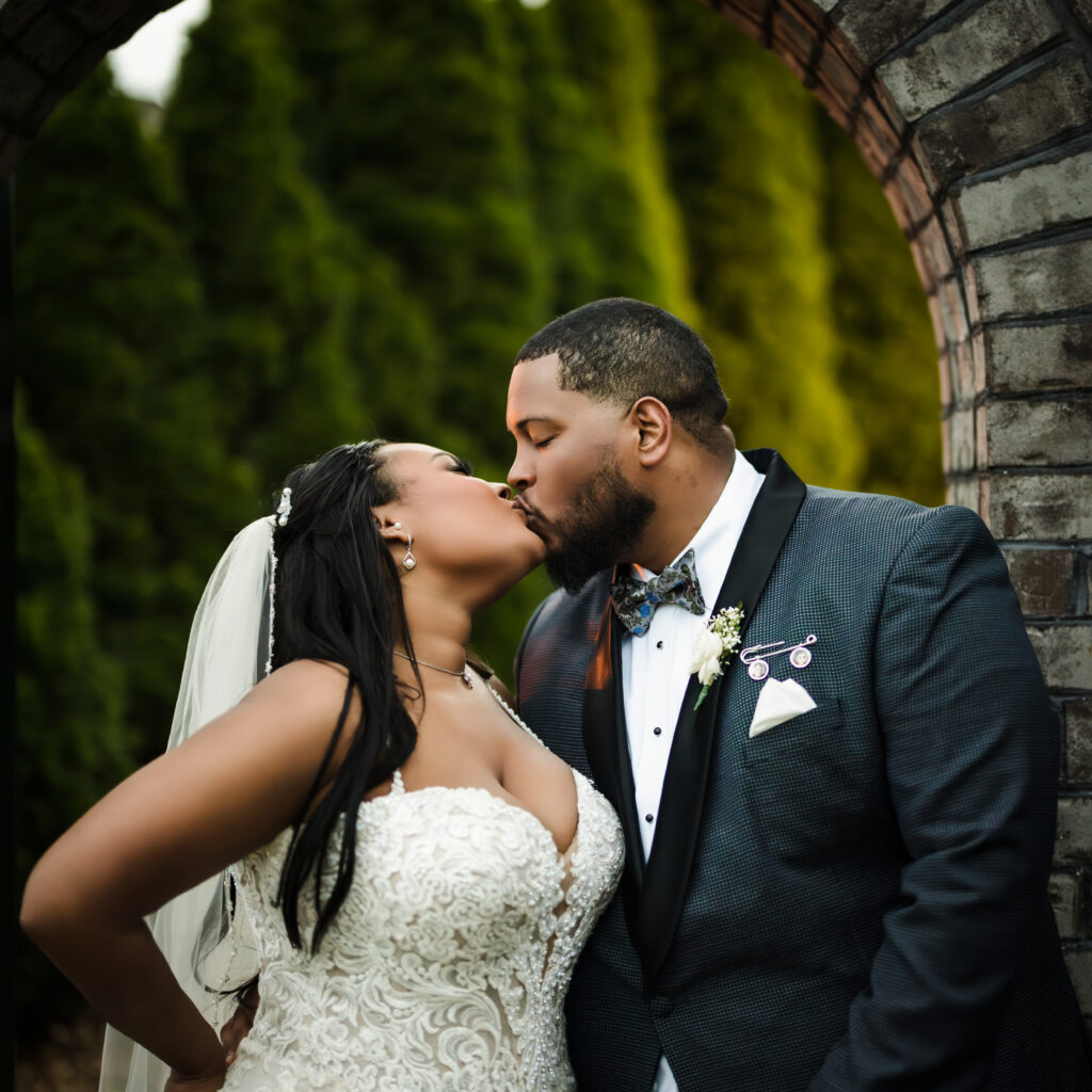 bride and groom kissing